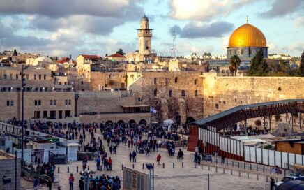 people gathered in front of concrete structures