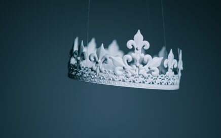 shallow focus photography white crown hanging decor