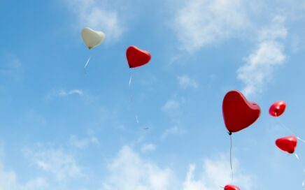 red and white heart balloons