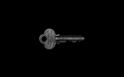 photo of key against black background