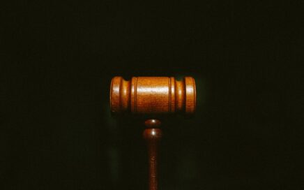 brown wooden stand with black background