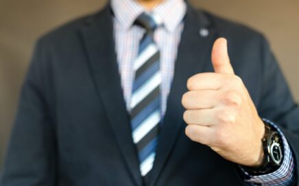 man in black formal suit jacket