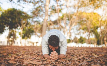 man kneeling