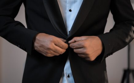 man wearing black suit jacket
