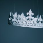 shallow focus photography white crown hanging decor