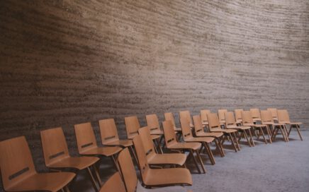 brown wooden chair lot inside room